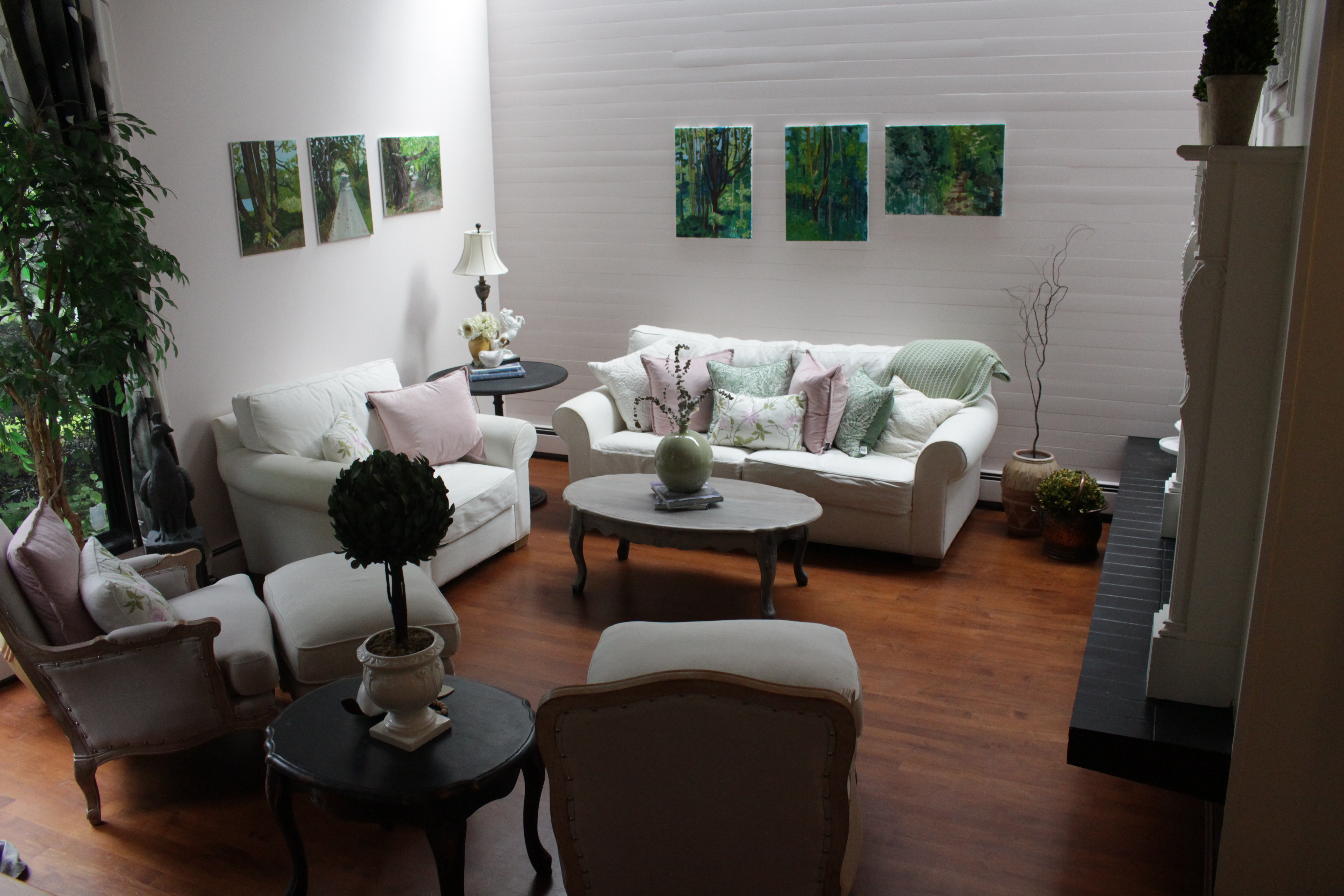 Elegant waiting area with comfortable seating and artwork at GuitarGarage