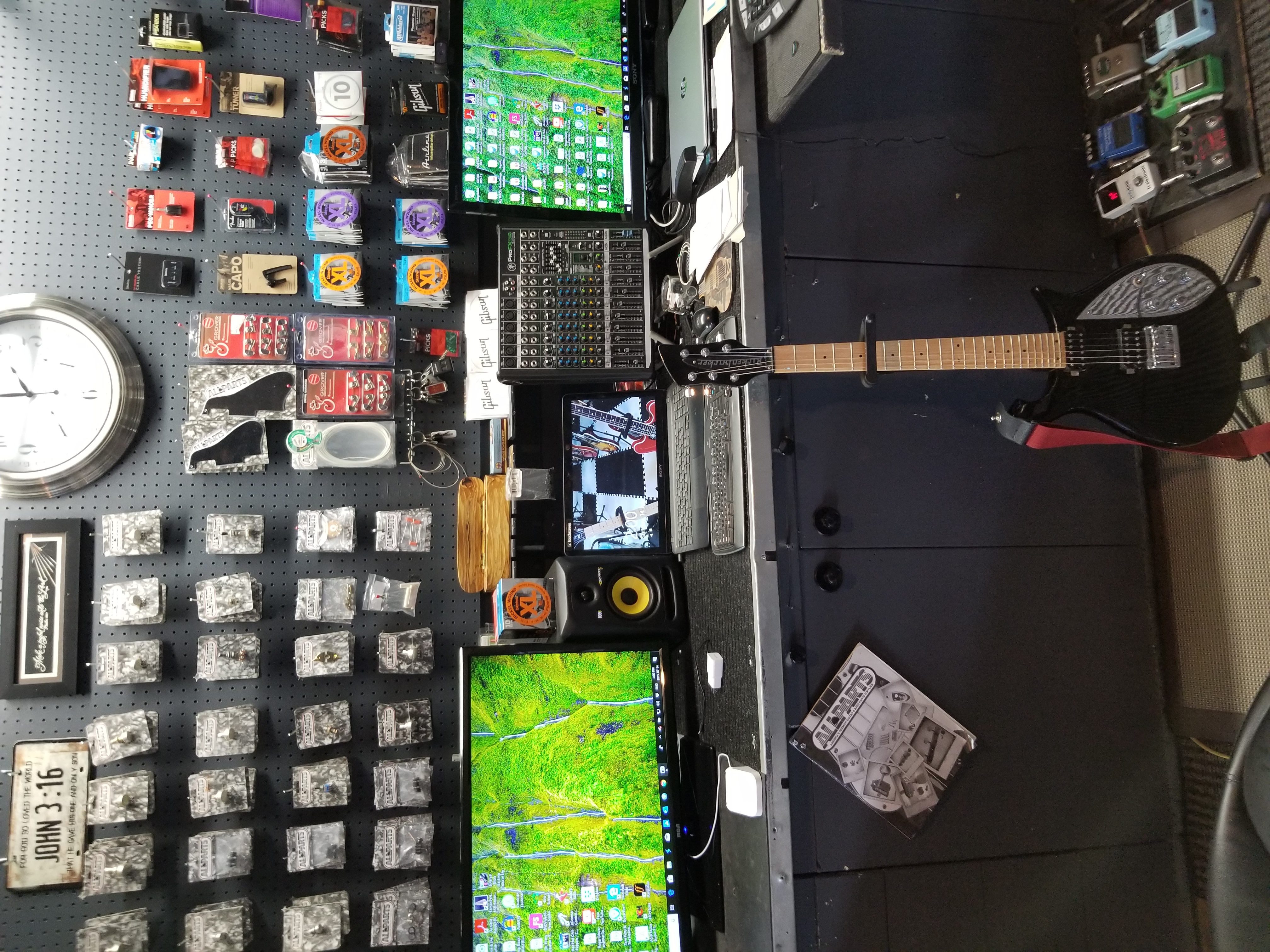 Guitar lesson setup showing recording equipment and teaching tools at GuitarGarage